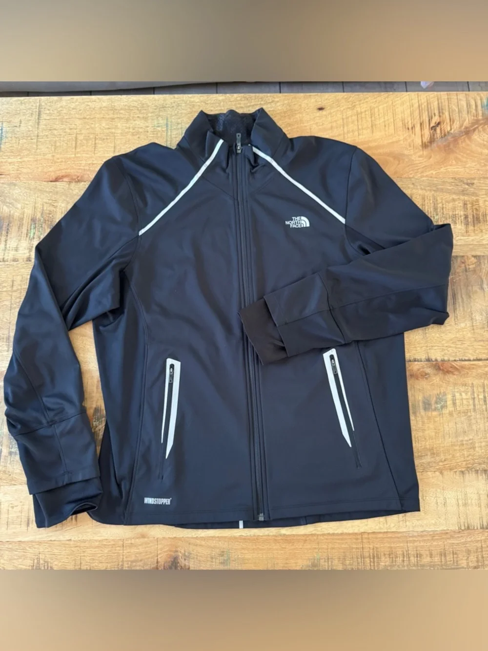 The North Face Men’s Black Lightweight Windstopper Jacket with Reflective Trim